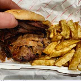 burger with chips served at Aldo’s Fish Bar in Broxburn